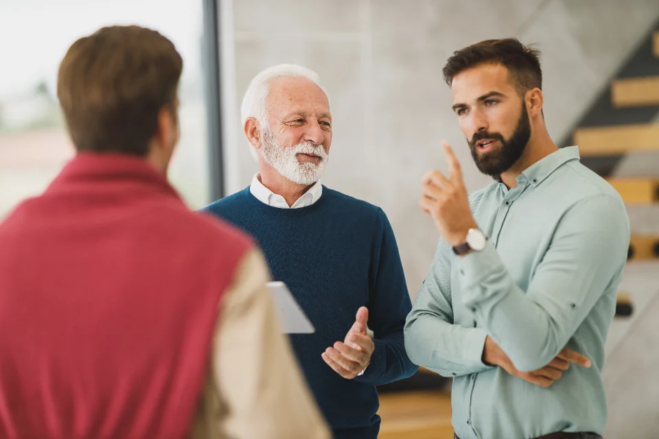 Group of people discussing information together.
